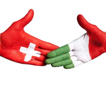 a handshake between italy and switzerland