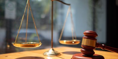 A judge gavel is prepared in the courtroom to be used to give a signal when the verdict is read after the trial is completed. Concept judge gavel is prepared to symbolize the decision in a court case.